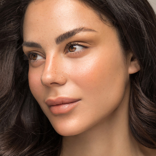 close-up-of-woman-with-clear-skin-looking-to-the-side