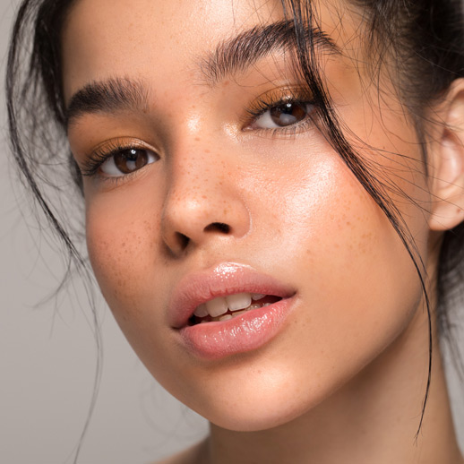 close-up-of-woman-with-smooth-skin-and-natural-expression