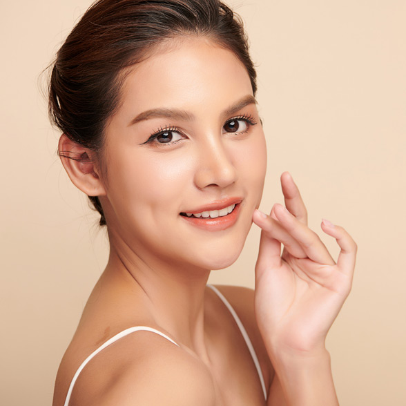 woman-smiling-with-radiant-smooth-skin