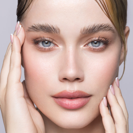 woman-touching-her-face-softly,-showing-smooth-skin