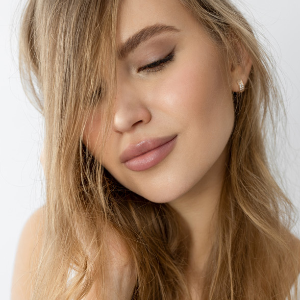 woman-with-smooth-skin-smiling-softly