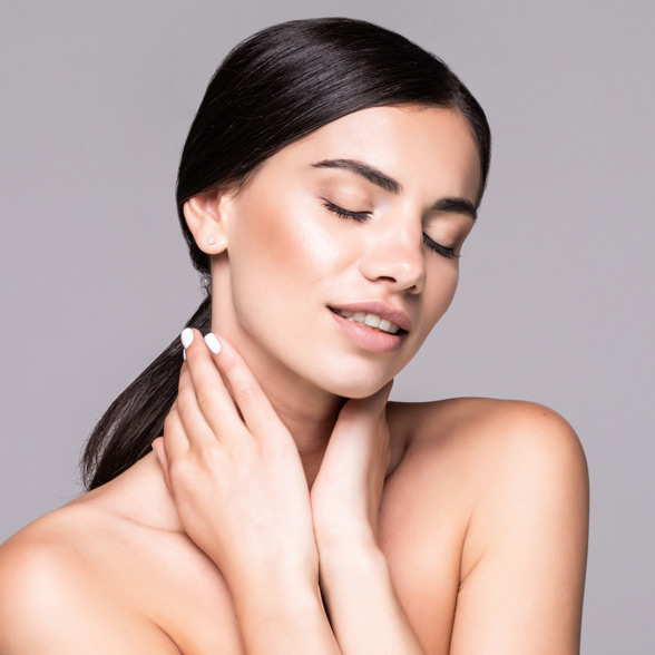 woman-with-smooth-skin-touching-her-face-gently