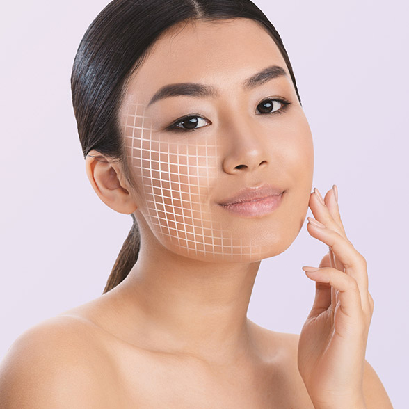 woman-touching-side-of-face-with-grid-overlay-1