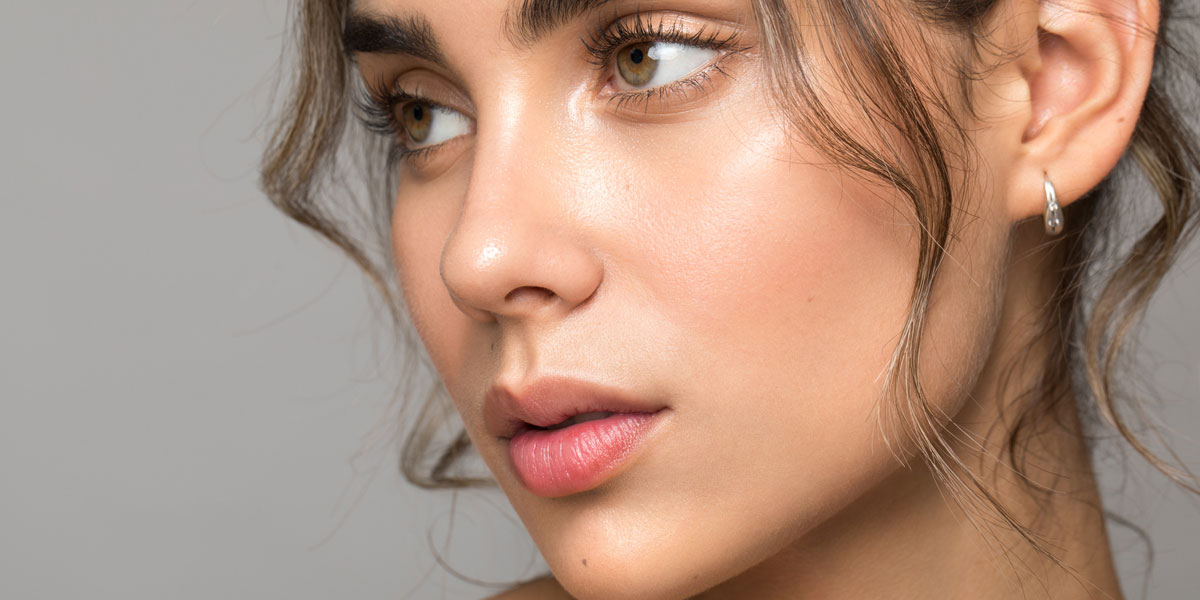 Close up of woman with smooth radiant clear skin